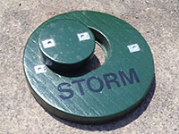 Custom Manhole Covers - 38 (Description: This Custom Double Ergonomic Manhole Cover is designed with an easy lift access port. The ten inch diameter port cover weighs four pounds. It saves labor costs and prevents injury.)