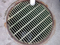 Custom Manhole Covers - 41 (Description: This custom drain cover allows for easy around the clock access to the drain with non-skid, one inch grating. Easy visibility inside the drain for a visual inspection and easy maintenance.)