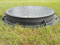 Traffic-Rated Lockable Manhole Covers - 2 (Description: Lockable - Traffic Rated - Fiberglass Manhole Cover and Frame)
