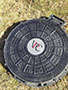 Manhole Risers - 7 (Description: VPC's hinged, lockable fiberglass manhole cover with a 24 inch clear opening can be customized with your logo or with the application. STORM, SEWER, WATER, and ELECTRIC are a few examples.)